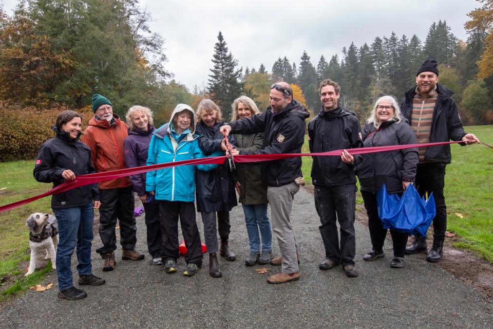 Members of Courtenay council and the McPhee family at the ribbon cutting to officially open McPhee Meadows on October 23, 2025