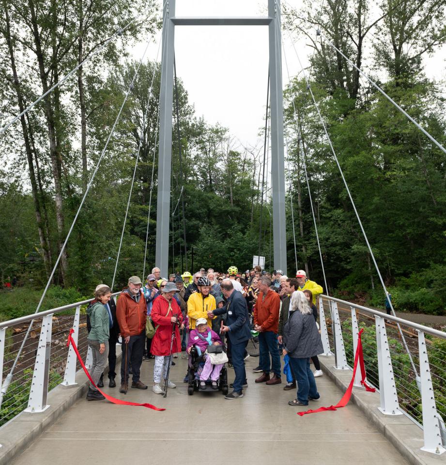ribbon cutting with Council and members of the public on the 6th Street Bridge