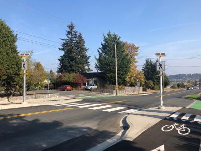 New crosswalk with freshly painted lines.