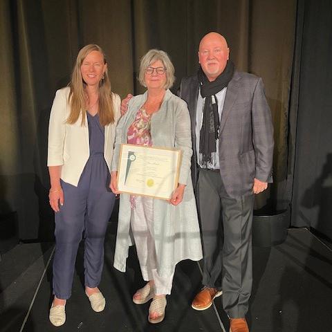 Courtenay staff members receiving award 